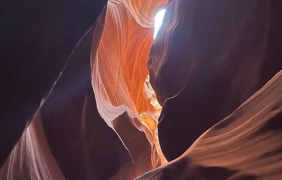 Page: Upper Antelope Canyon Guided Tour - The canyon walk: one-way route, narrow walls, and sunbeams